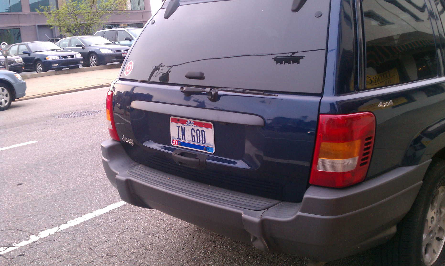 Jeep with Ohio plate: "IM GOD"
